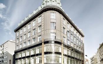 Elegant corner building at Fleischmarkt 1 offering modern office space rental in Vienna's 1010 Innere Stadt district.